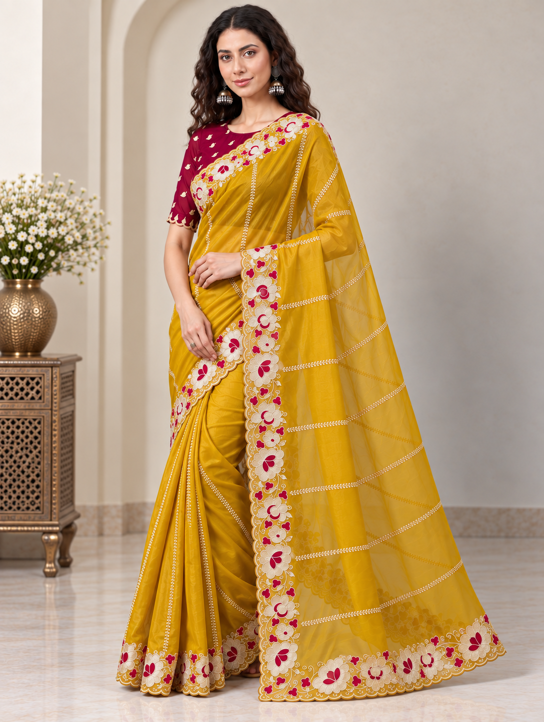 Zegoom Yellow Satin Silk Saree with Floral Embroidery & Scalloped Border