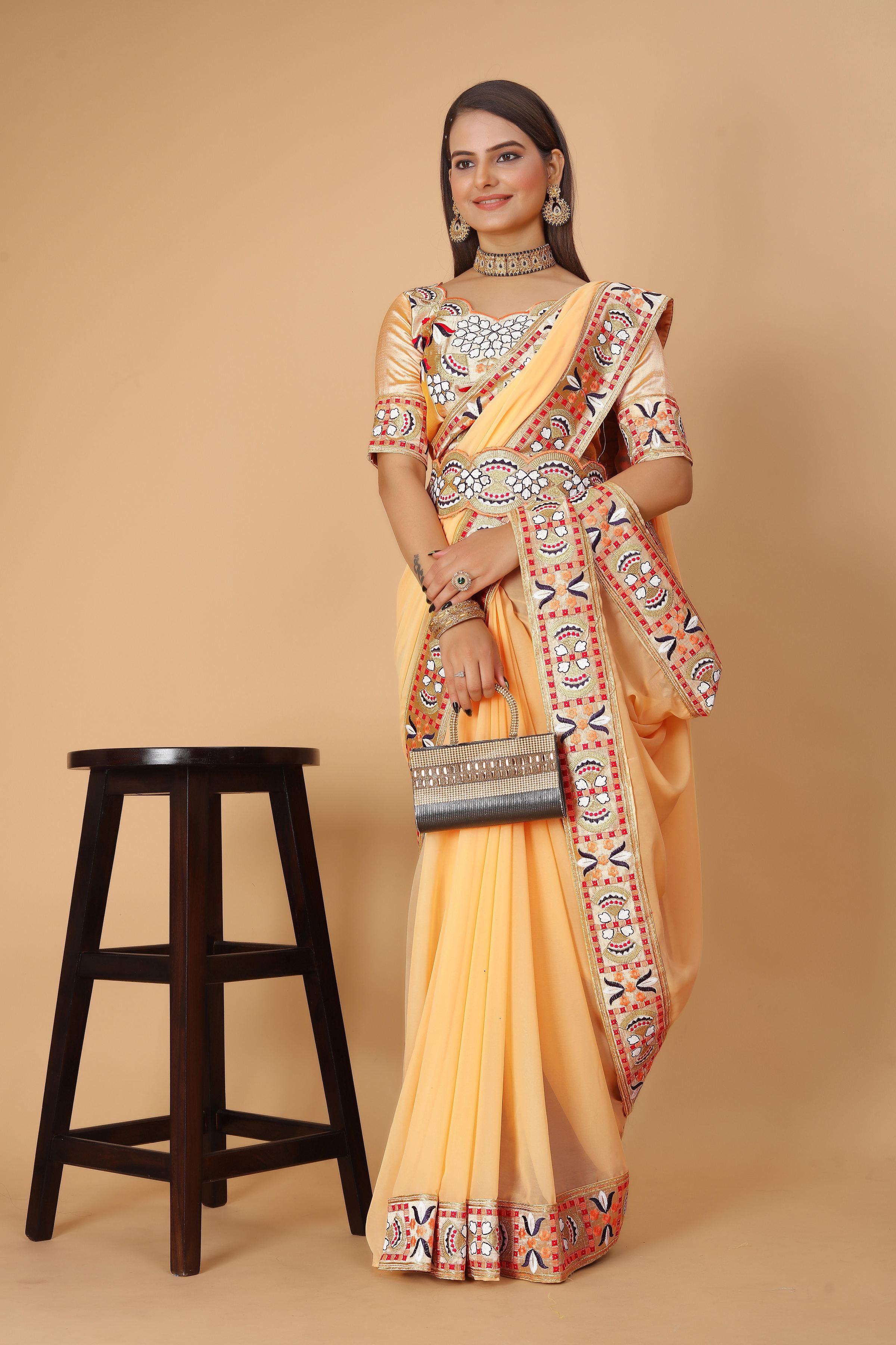 Yellow Georgette Saree with Heavy Ethnic Embroidery Border