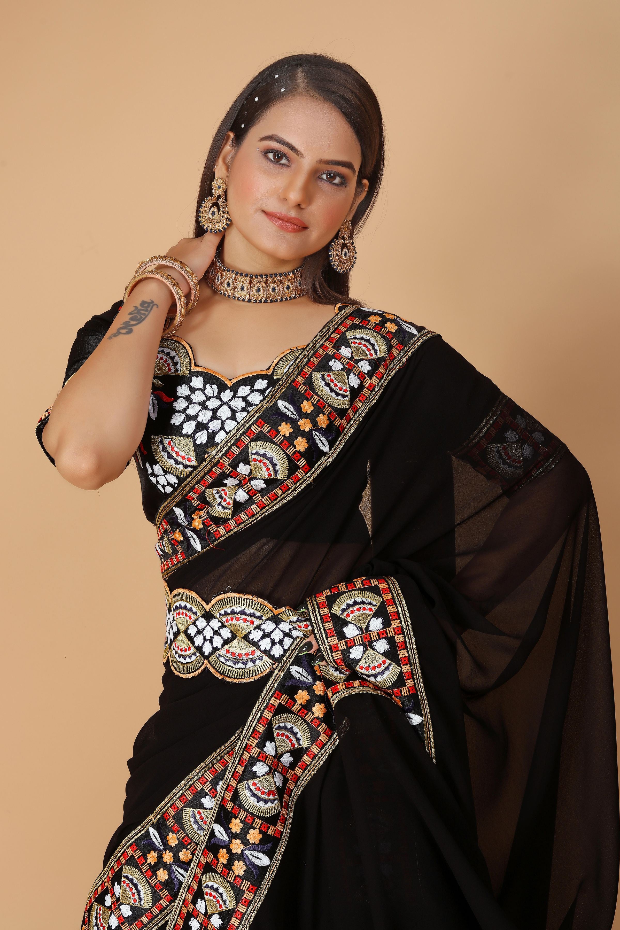 Black Georgette Saree with Heavy Ethnic Embroidery Border