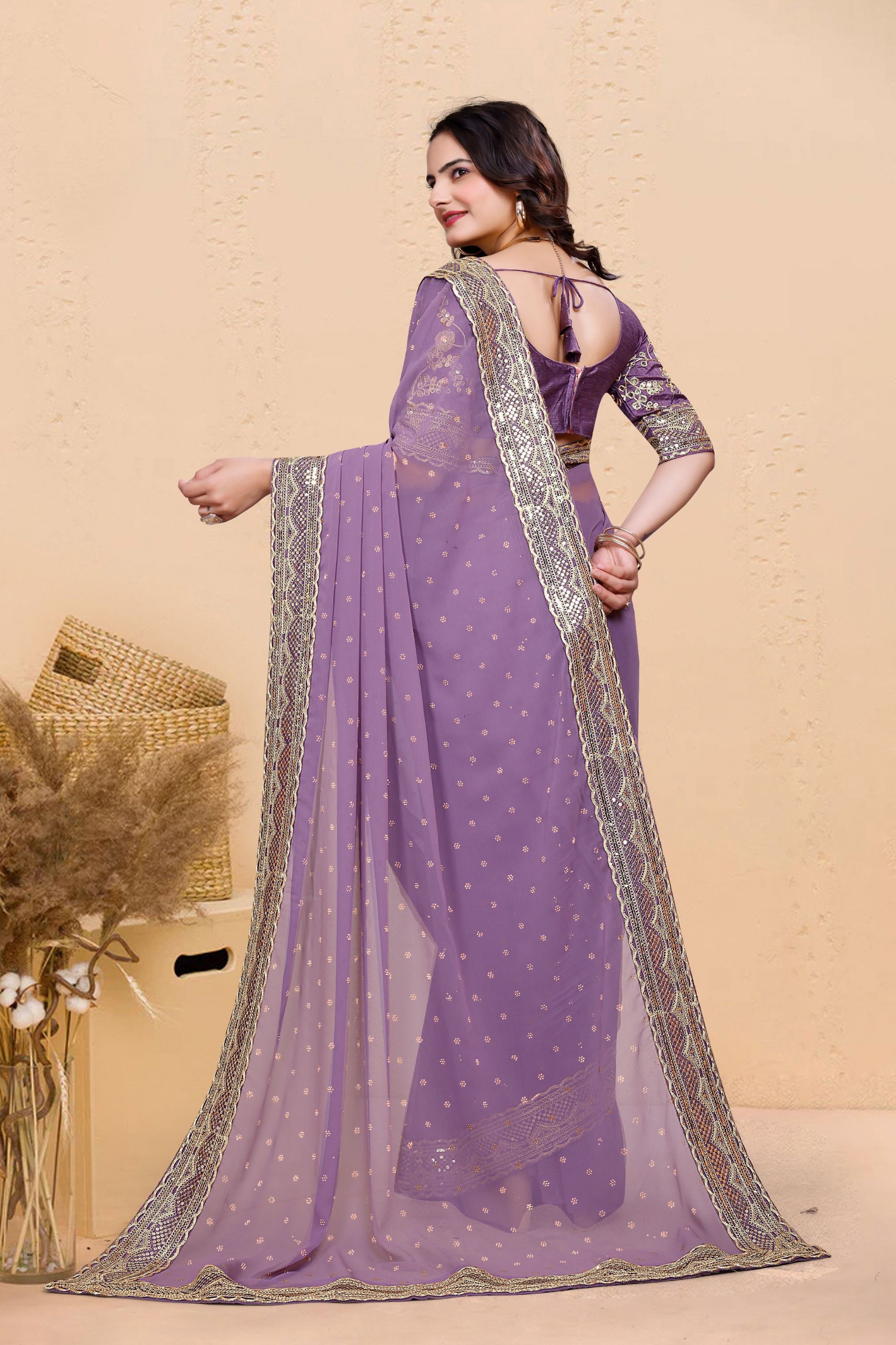Lavender Soft Georgette Sequence Butti & Heavy Lace Border Saree