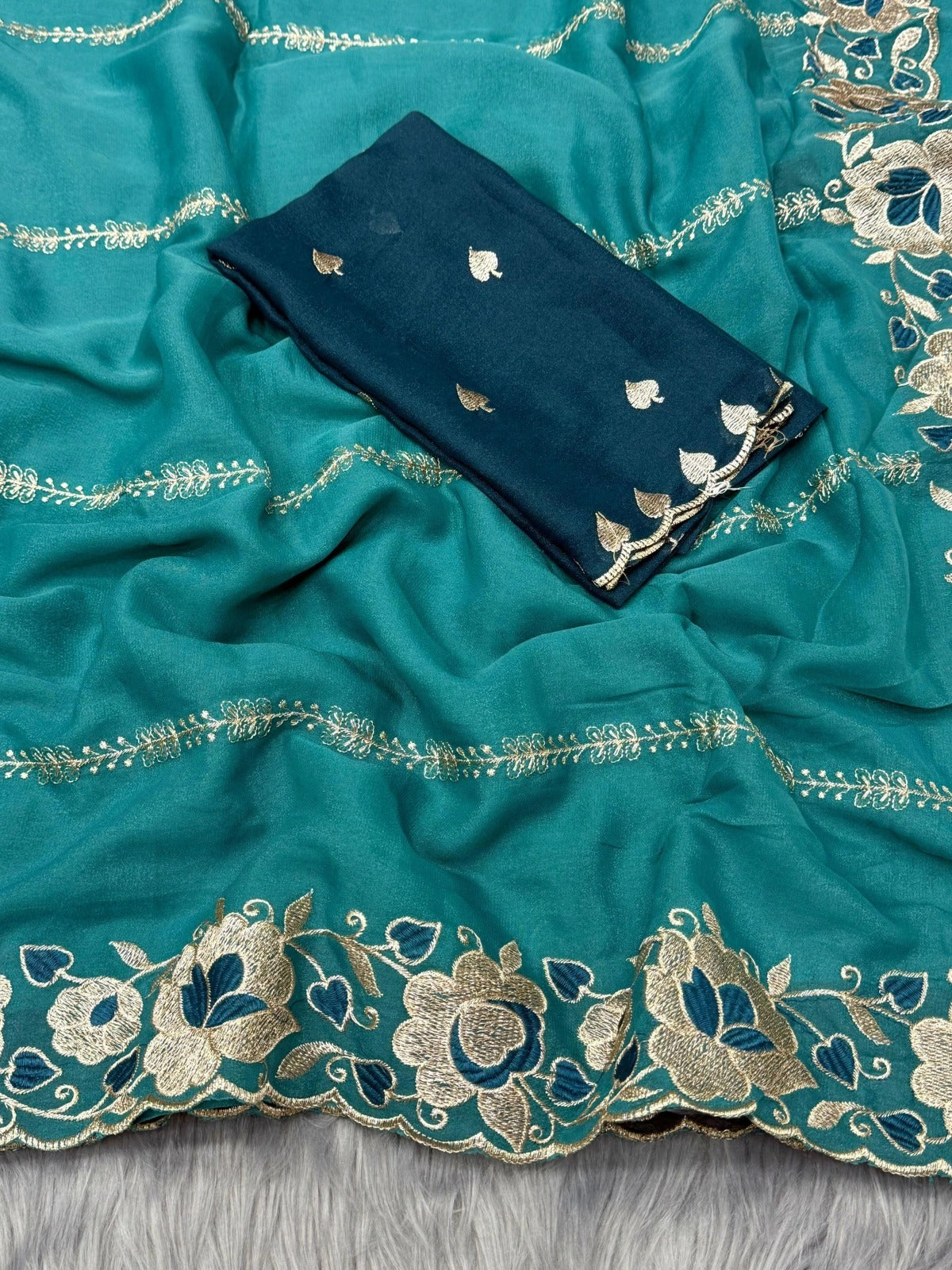 Zegoom Teal Satin Silk Saree with Floral Embroidery & Scalloped Border