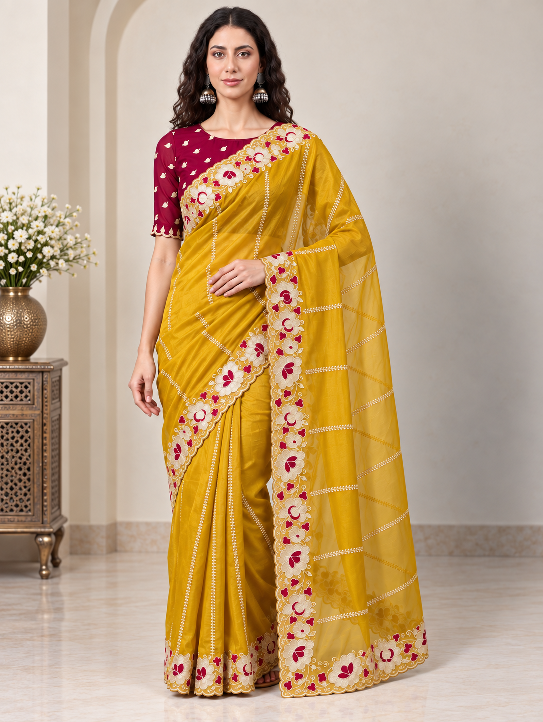 Zegoom Yellow Satin Silk Saree with Floral Embroidery & Scalloped Border