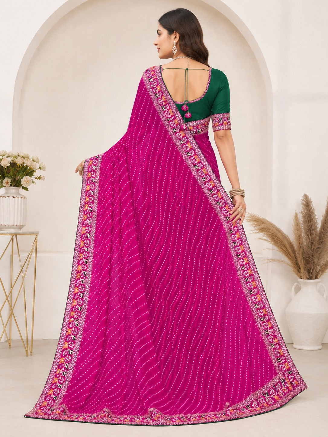 Pink Leheriya Printed Saree with Embroidered Lace Border & Green Blouse Piece
