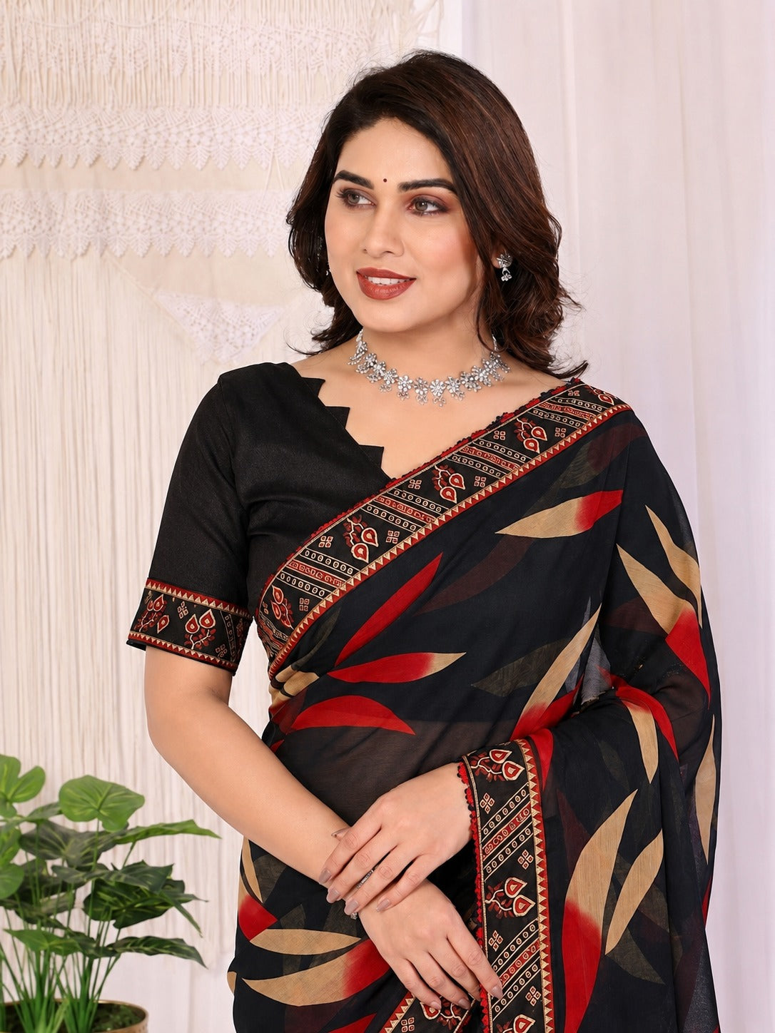 Black Floral Printed Saree with Ethnic Border Design