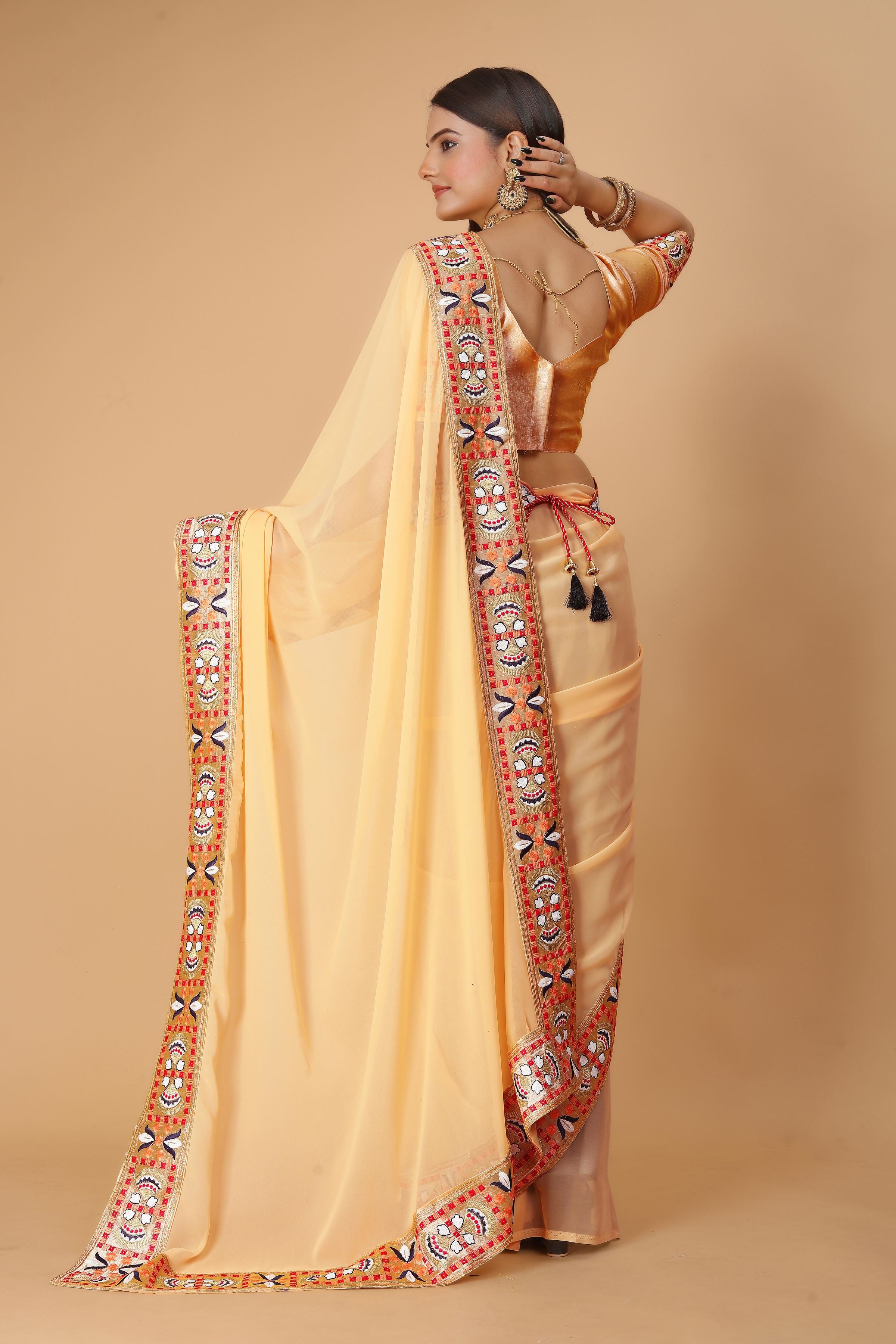 Yellow Georgette Saree with Heavy Ethnic Embroidery Border