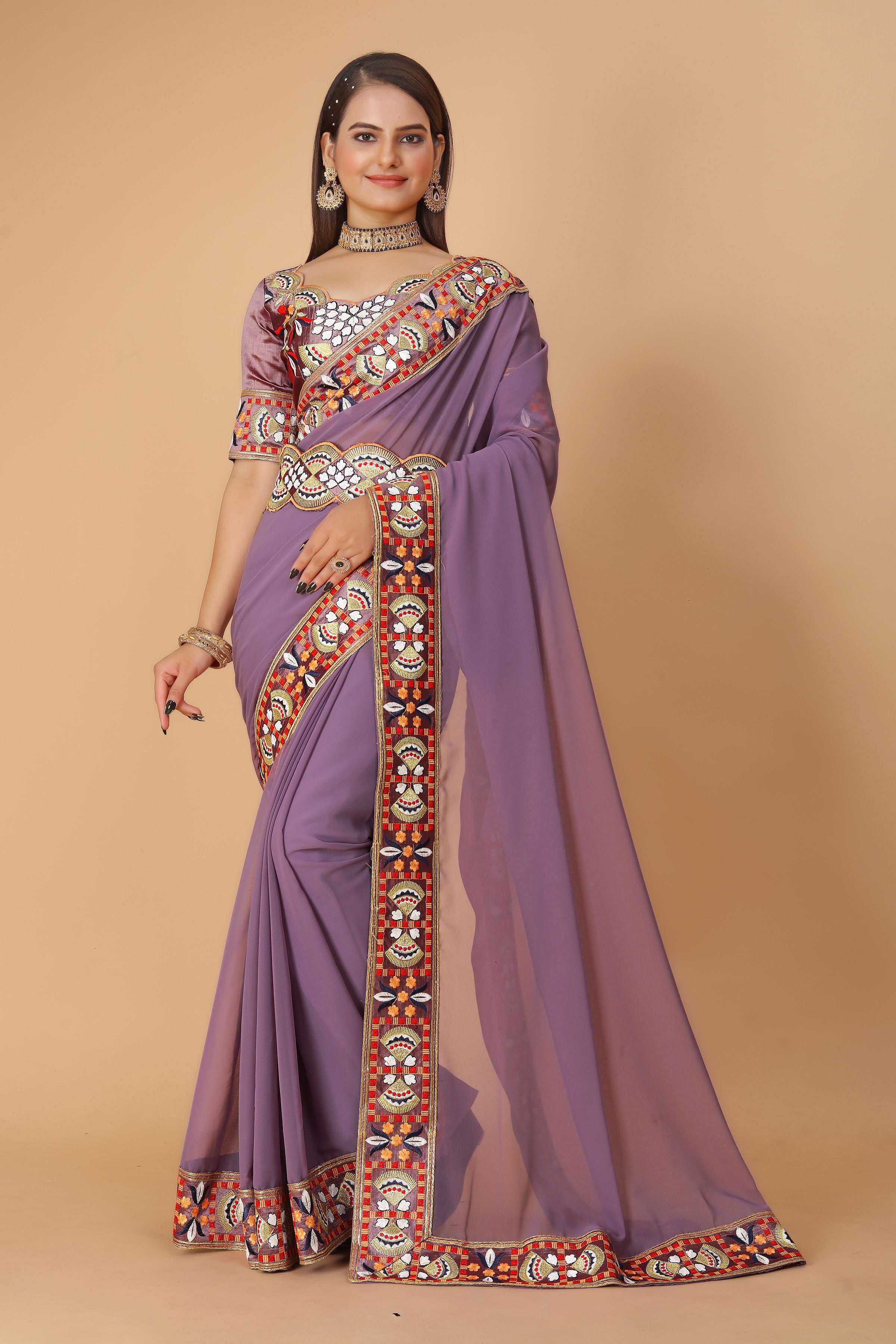 Mauve Georgette Saree with Heavy Ethnic Embroidery Border