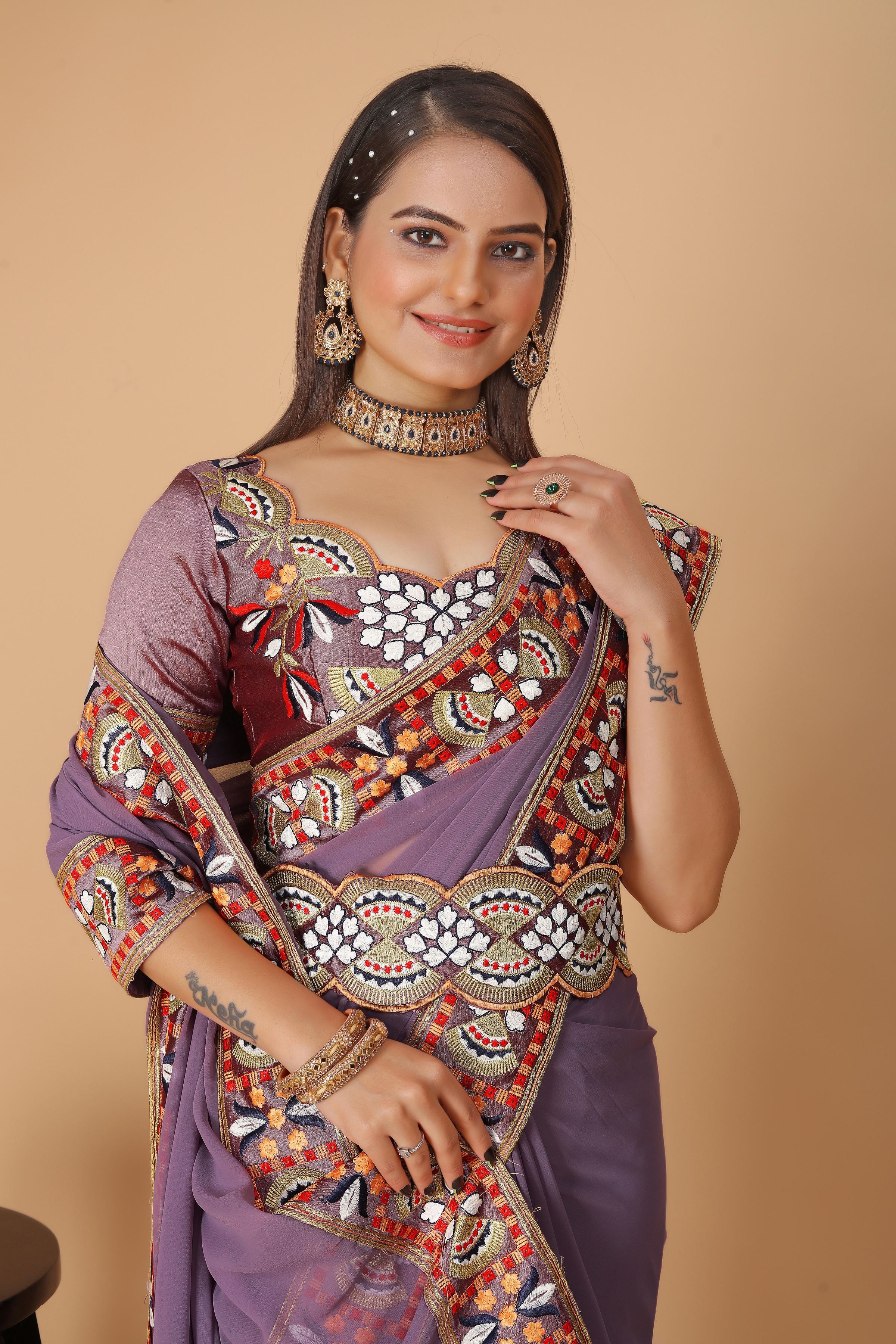 Mauve Georgette Saree with Heavy Ethnic Embroidery Border