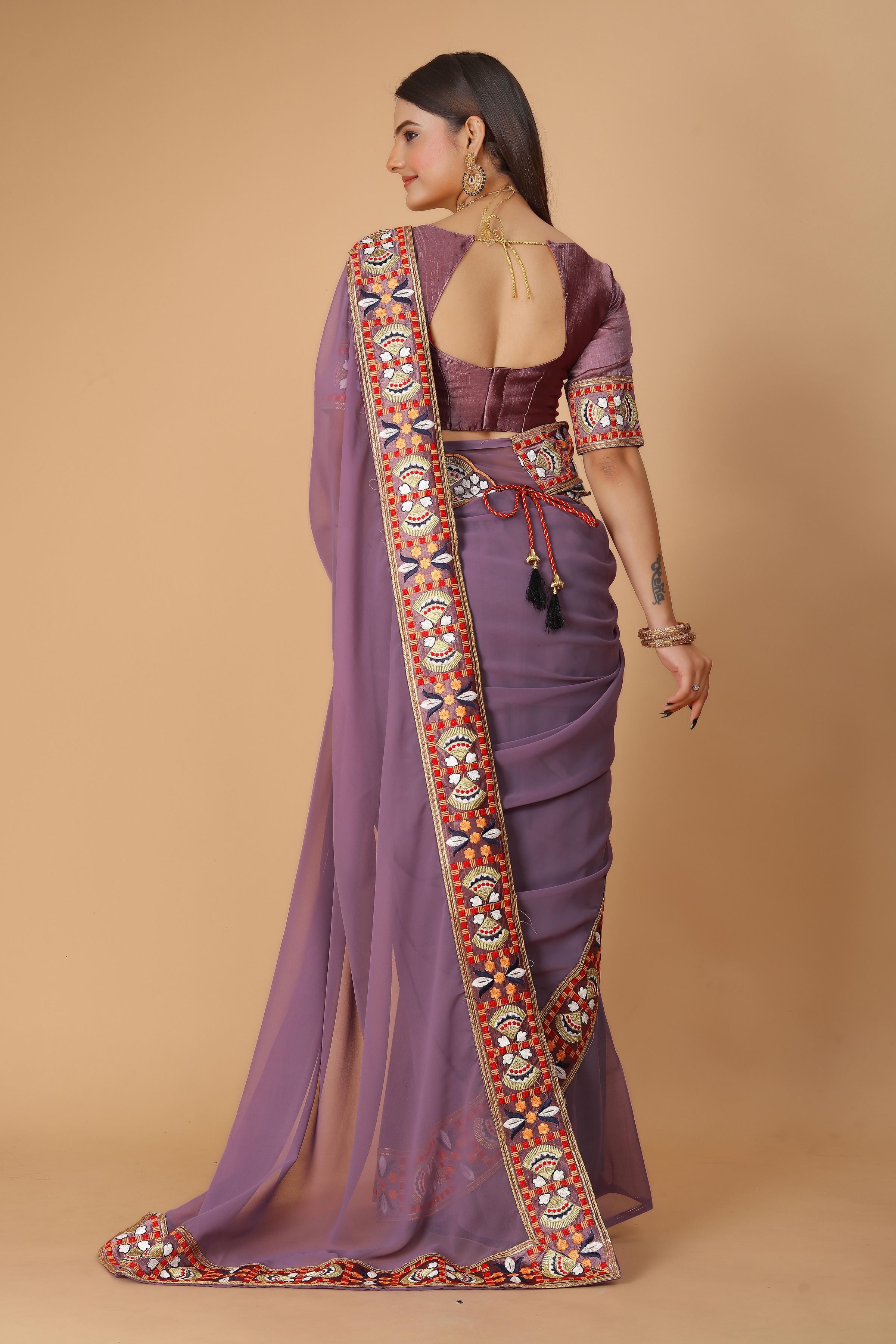 Mauve Georgette Saree with Heavy Ethnic Embroidery Border