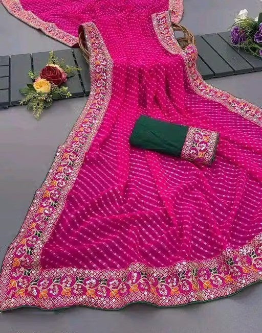 Pink Leheriya Printed Saree with Embroidered Lace Border & Green Blouse Piece